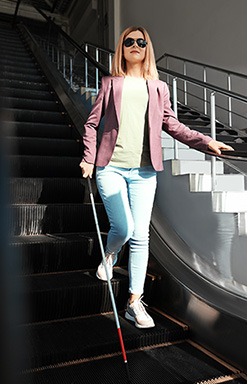 Visually impaired woman on steps
