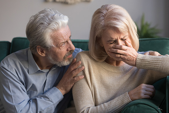 mature couple in emotional distress